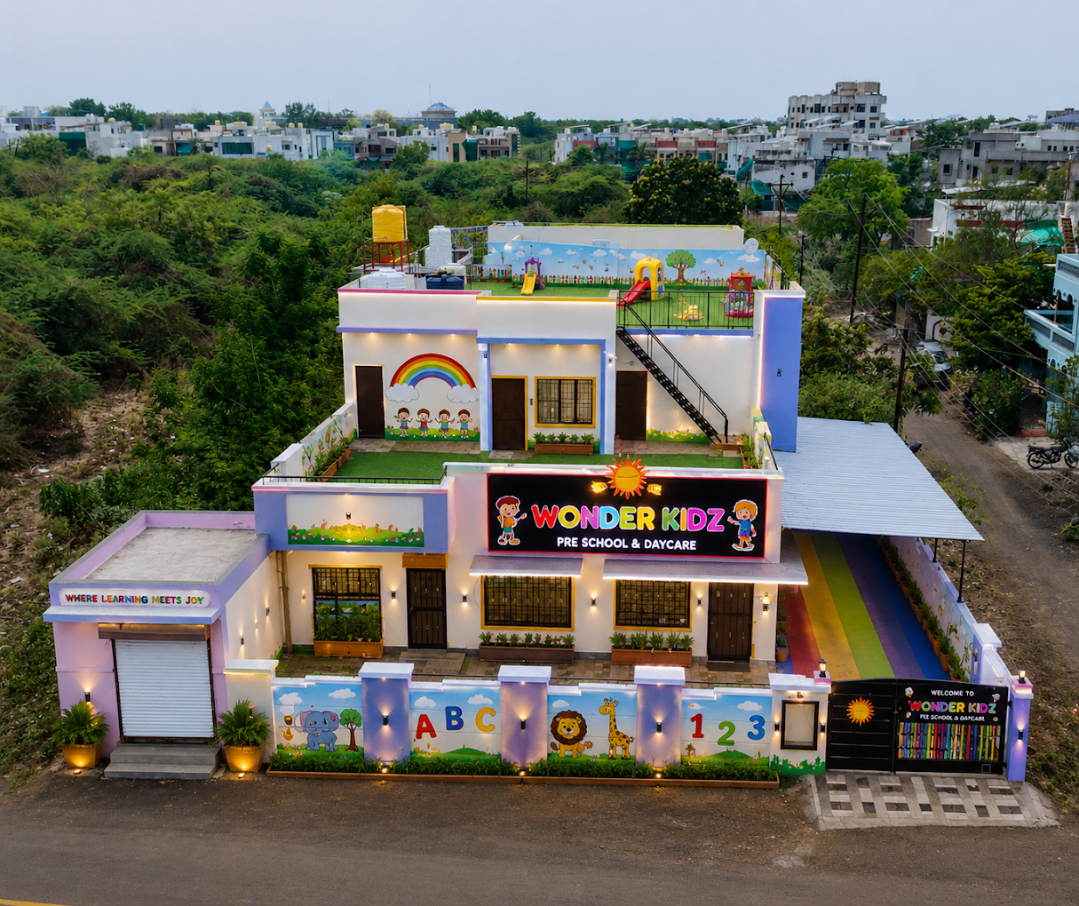 WonderKidz preschool campus with rainbow play area